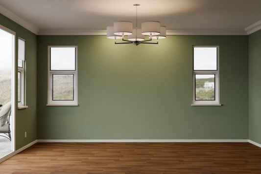 A living room with olive green paint near Petoskey and Harbor Springs, Michigan